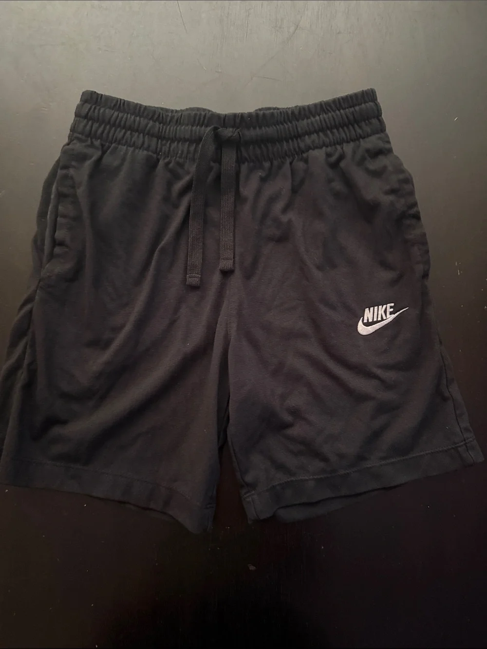 Nike Men's Black Athletic Shorts with White Swoosh